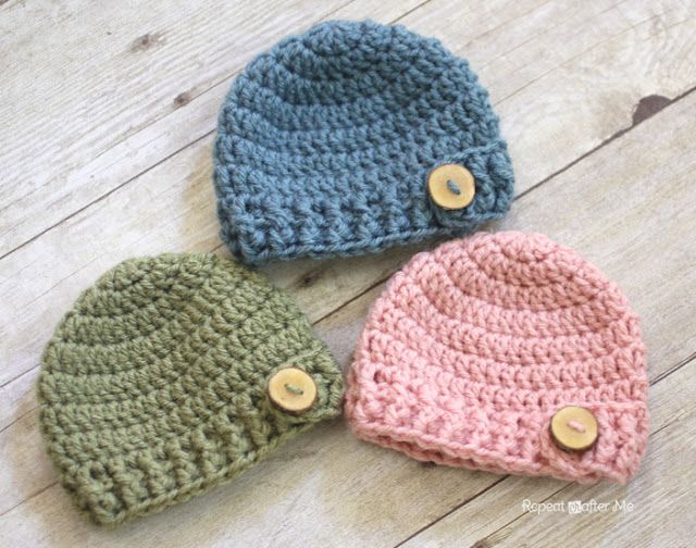 crochet baby hats i like the idea of using wooden or another type of buttons on the hat BTGAJGE