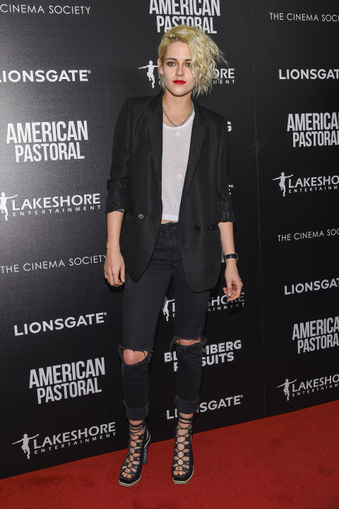 kristen stewart style kristen stewart opts for a tough look of distressed jeans and lace up heels GCKGTAD