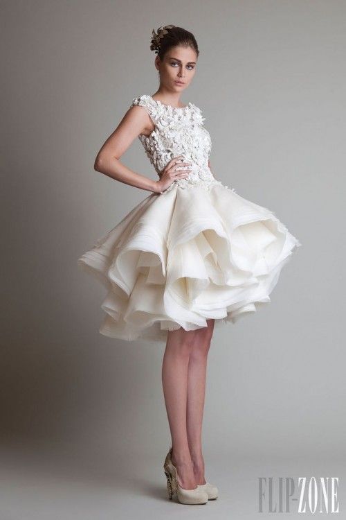 Why you need to consider a short wedding dress for your big day