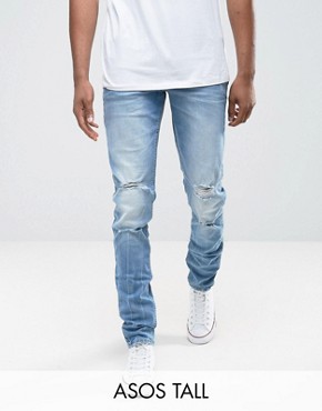 skinny jeans for men asos tall skinny jeans in mid wash blue with rips RDOHGLX