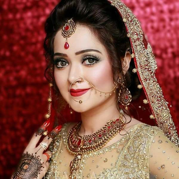 bridal makeup in red dress - Fabulax Style