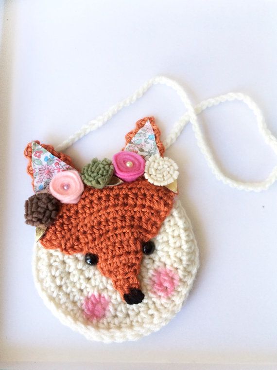 Meet Fiona the Fox! She is part of our crochet purse line and is a