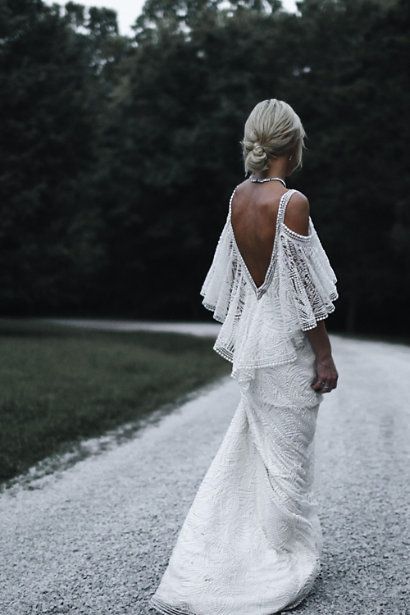 Open back off-the-shoulder column gown trimmed with a dramatic .